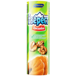 This image shows packaging for Pobeda brand biscuits named Everest. The label is predominantly green with blue and white lettering. Ореховка is written on the packaging, suggesting a nut (likely walnut) flavor, as there are images of walnuts and biscuits on the front. The text in Cyrillic indicates that the product