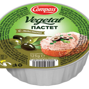 The image shows a sealed container of Compass brand Vegetal Пастет (vegetable pâté) with olives. The packaging features an image of bread topped with pink pâté, garnished with olives and herbs. The text includes nutritional information, a barcode, and the weight of 125 grams. The design is predominantly green with accents of brown and purple from the olives.