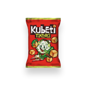 This image shows a packet of Kubeti snacks in a red bag with yellow edges. The packaging features bold white and yellow text that reads Kubeti Tzatziki Flavour. A cartoon character that resembles a playful, anthropomorphic head of lettuce is illustrated in the center, surrounded by several toasted cube-shaped croutons. The design emphasizes a fun and lively snack experience.