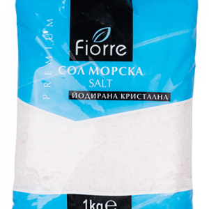 The image shows a 1kg package of Fiore brand iodized sea salt. The bag has a blue and black design with white text. The words PREMIUM, SALT, and 1kg are prominently displayed. The product seems to feature a modern, clean design with a focus on its premium quality.