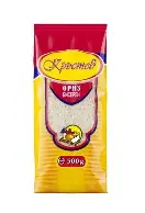 The image shows a package of rice. The packaging is mainly red and yellow. In the center, there is a transparent section displaying white rice. At the top, there is text in a decorative yellow label. Below the transparent section, there is a circular icon featuring a chef and additional text indicating the weight of the package as 500g.
