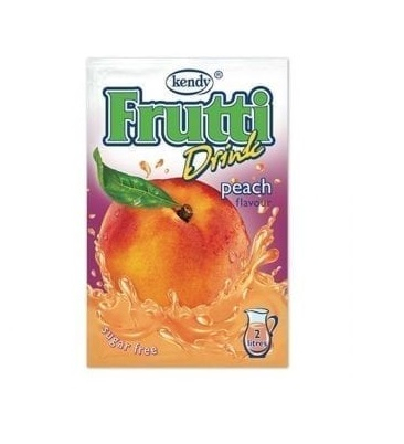 The image shows a package of Frutti Drink by Kendy. The flavor is peach, as indicated on the packaging. The front features an image of a peach with splashing juice around it. The drink is labeled as sugar free, and there's an icon indicating it makes two liters. The background is a gradient of purple to orange, complementing the peach theme.