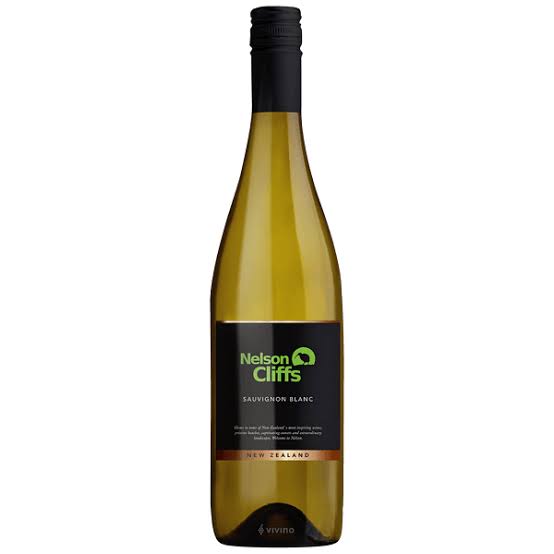 The image shows a bottle of wine labeled Nelson Cliffs Sauvignon Blanc. It features a black label with lime green and white text. The bottle has a dark screw cap and a narrow neck. The label also includes the text New Zealand at the bottom, indicating the wine's origin. The glass is clear, showing the light color of the wine inside.