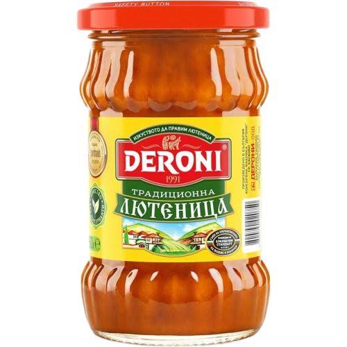The image shows a jar of Deroni brand Lyutenitsa, a traditional Bulgarian spread. The jar has a red lid and a yellow label featuring the Deroni logo at the top. Below the logo, the label is written in Bulgarian, and there's an illustration of a pastoral scene with houses. The design suggests a focus on tradition and quality.
